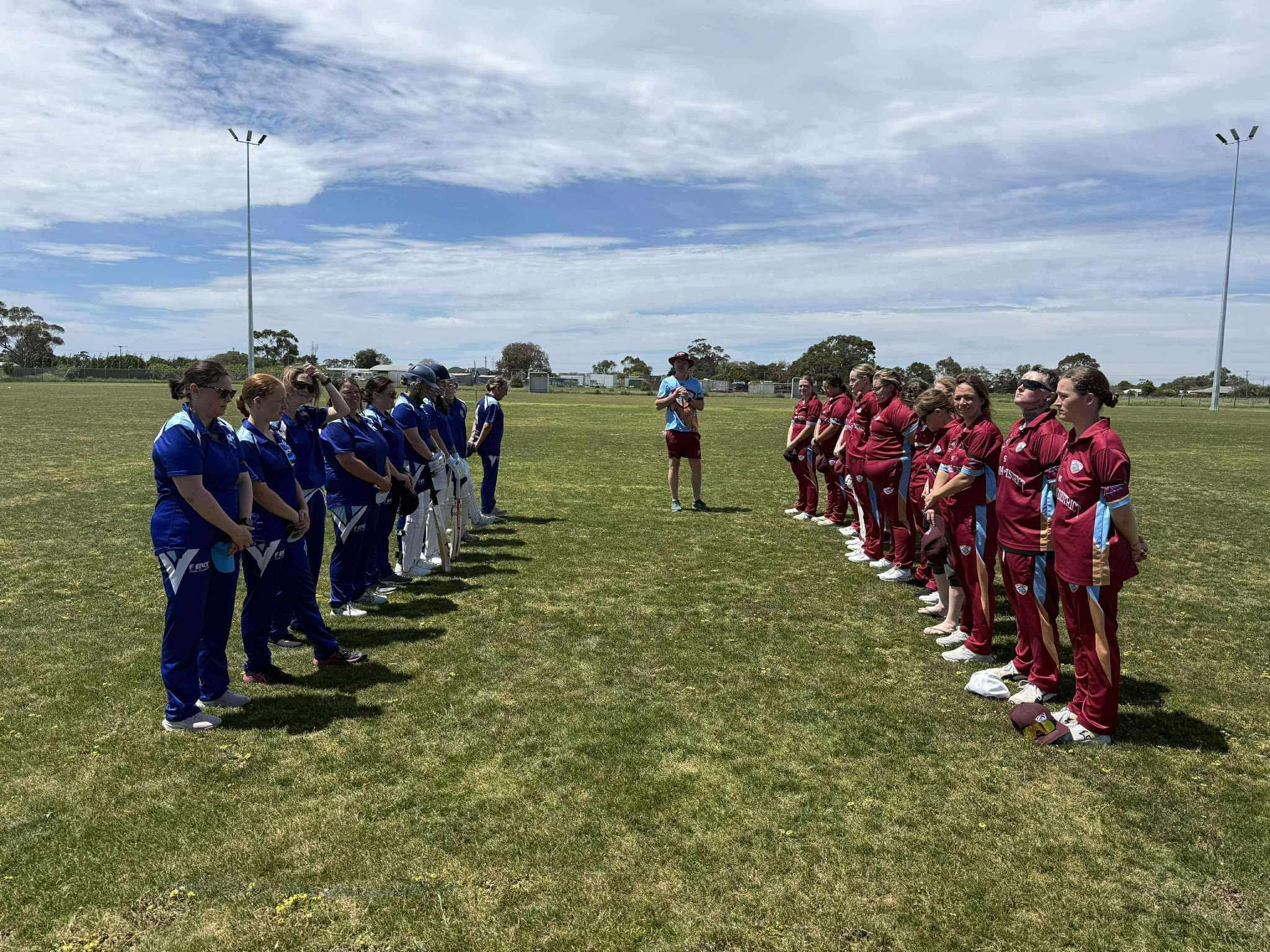 NDCC women in maroon and opposition in blue lined up before a match